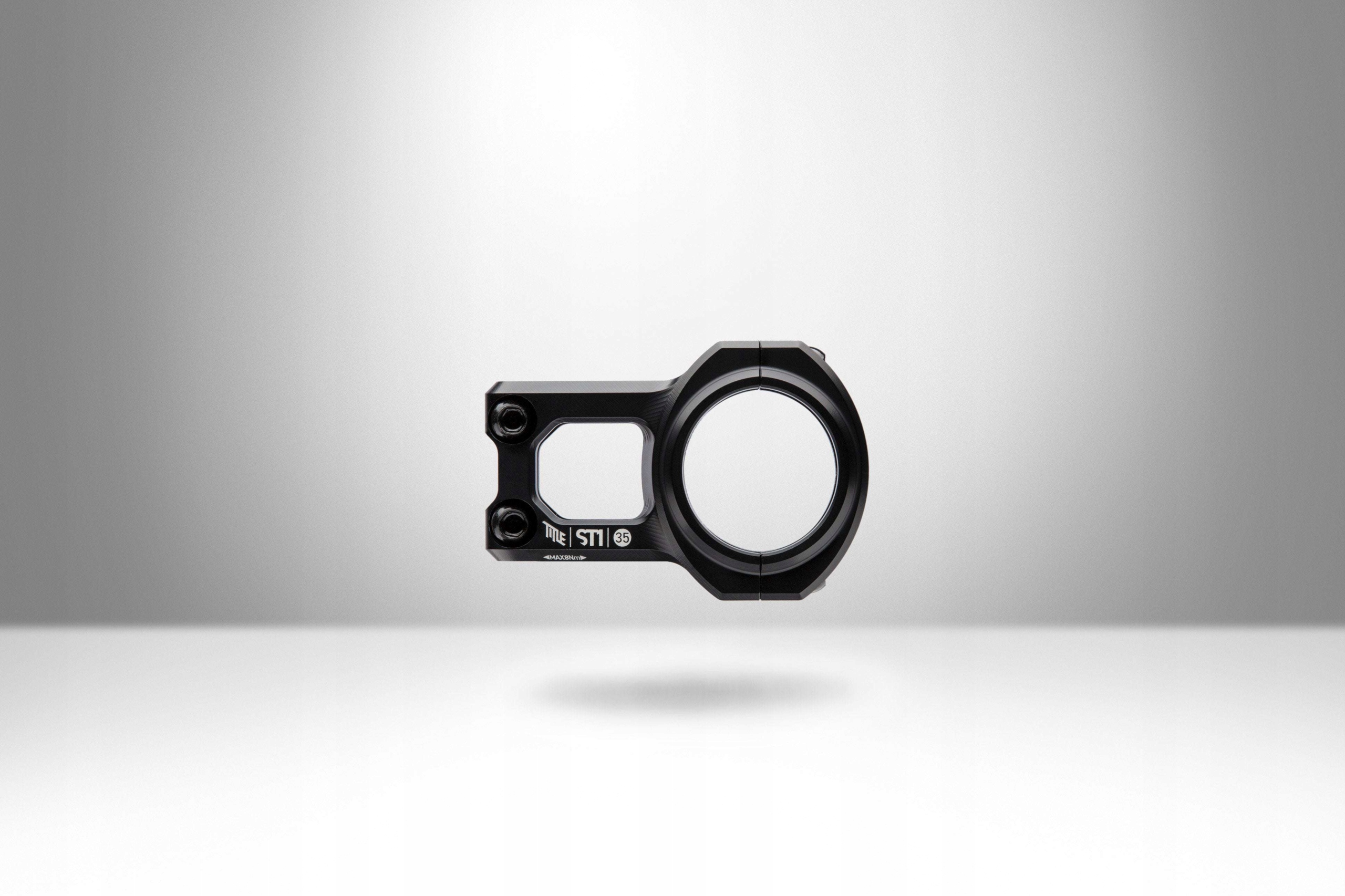 Black aluminum MTB stem with a 35mm clamp diameter, featuring a sleek design and two bolt mounting system for secure attachment.
