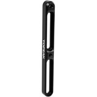 Black Topeak Bottle Cage Mount Extender, slim metal bar with two elongated slots and TOPEAK logo in white.