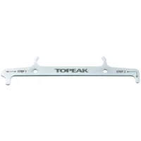 Silver Topeak chain hook and wear indicator with two hooks, engraved steps, and brand logo in the center.
