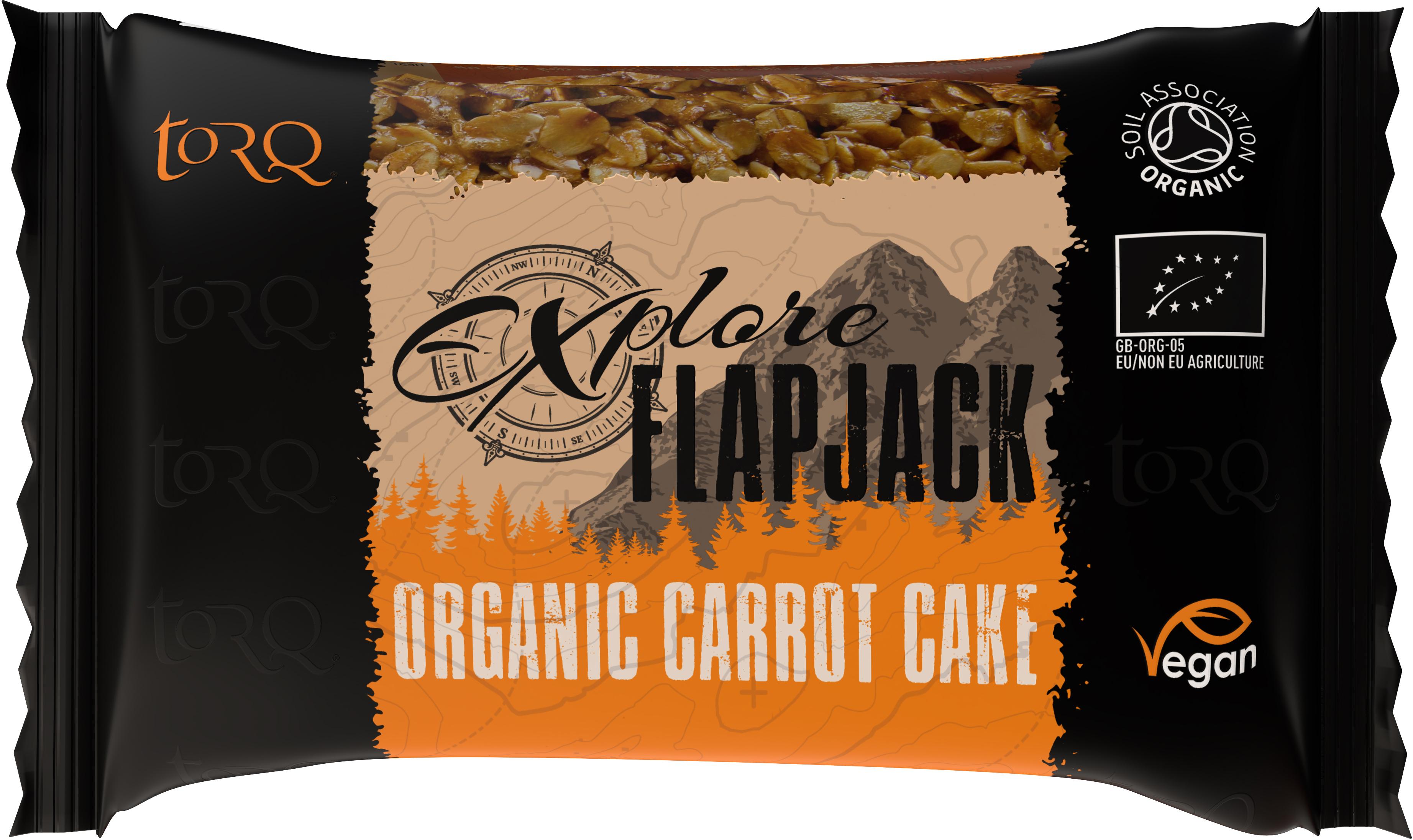 Black and orange TORQ Explore flapjack wrapper with carrot cake image and vegan label.