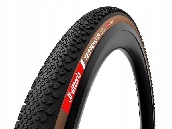 Vittoria Terreno T50 Mixed G2.0 TLR gravel tyre in black with tan sidewalls, featuring a textured tread pattern for enhanced grip, sized 700 x 45.