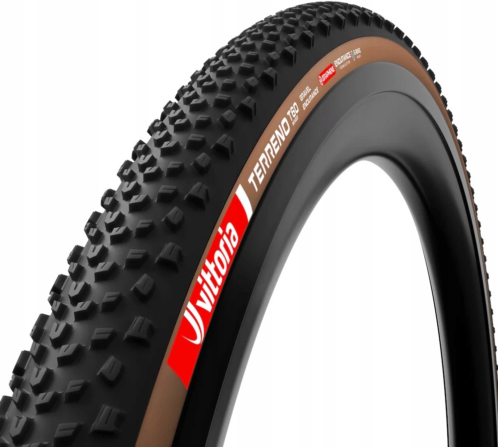 Vittoria Terreno T60 Mixed G2.0 TLR gravel tyre in tan and black, featuring a textured tread for grip, with a 700 x 45 size and prominent branding on the sidewall.