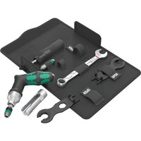 Wera 9524 7 Piece Solar Installation Tool Kit with ergonomic handles, wrenches, and attachments on a black mat.