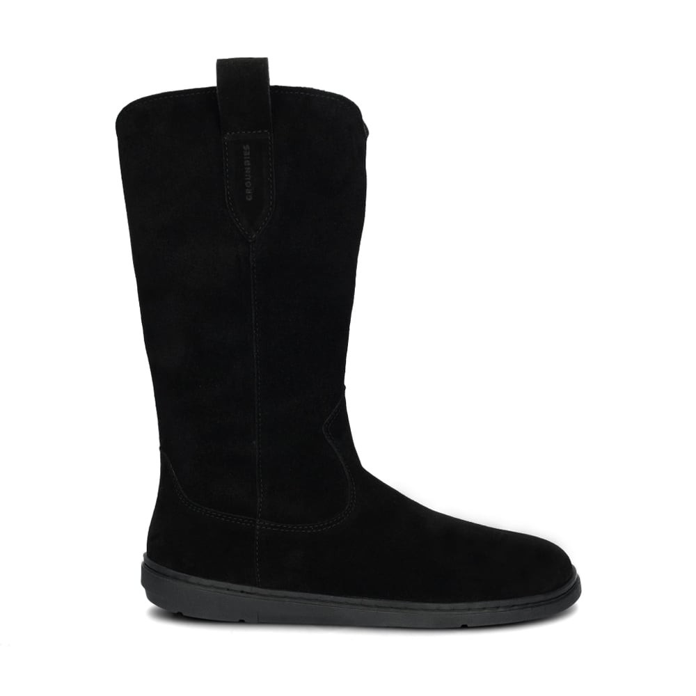 Black suede knee-high boots with a sleek design, featuring a pull tab at the back and a flexible black sole for comfort and style.