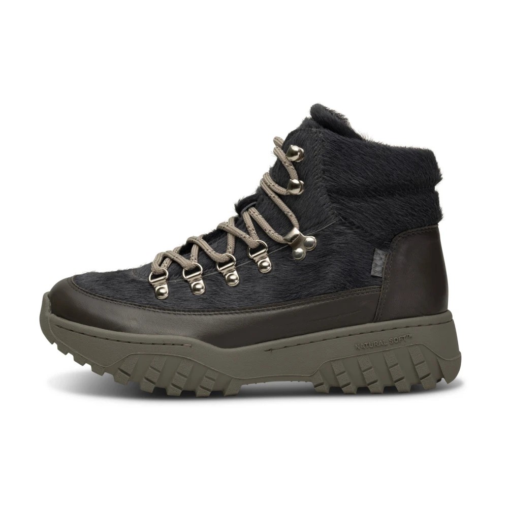 Women's Woden Iris Track LH boots in dark gray with a textured fur upper, featuring metallic eyelets, gray laces, and a chunky olive green sole for traction.