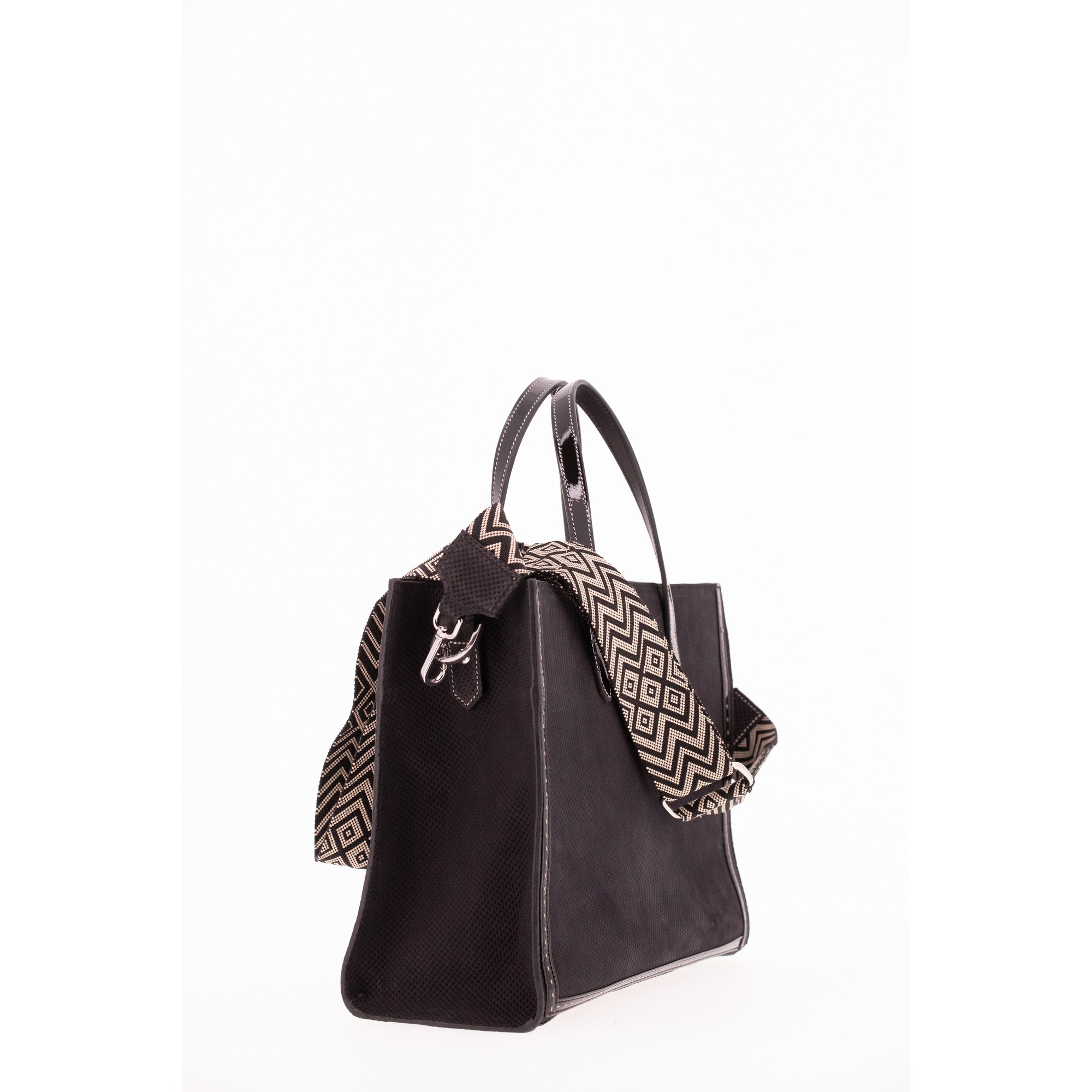Stylish black women's handbag by Pénélope, featuring a textured exterior, dual handles, and a patterned shoulder strap for versatile carrying options.