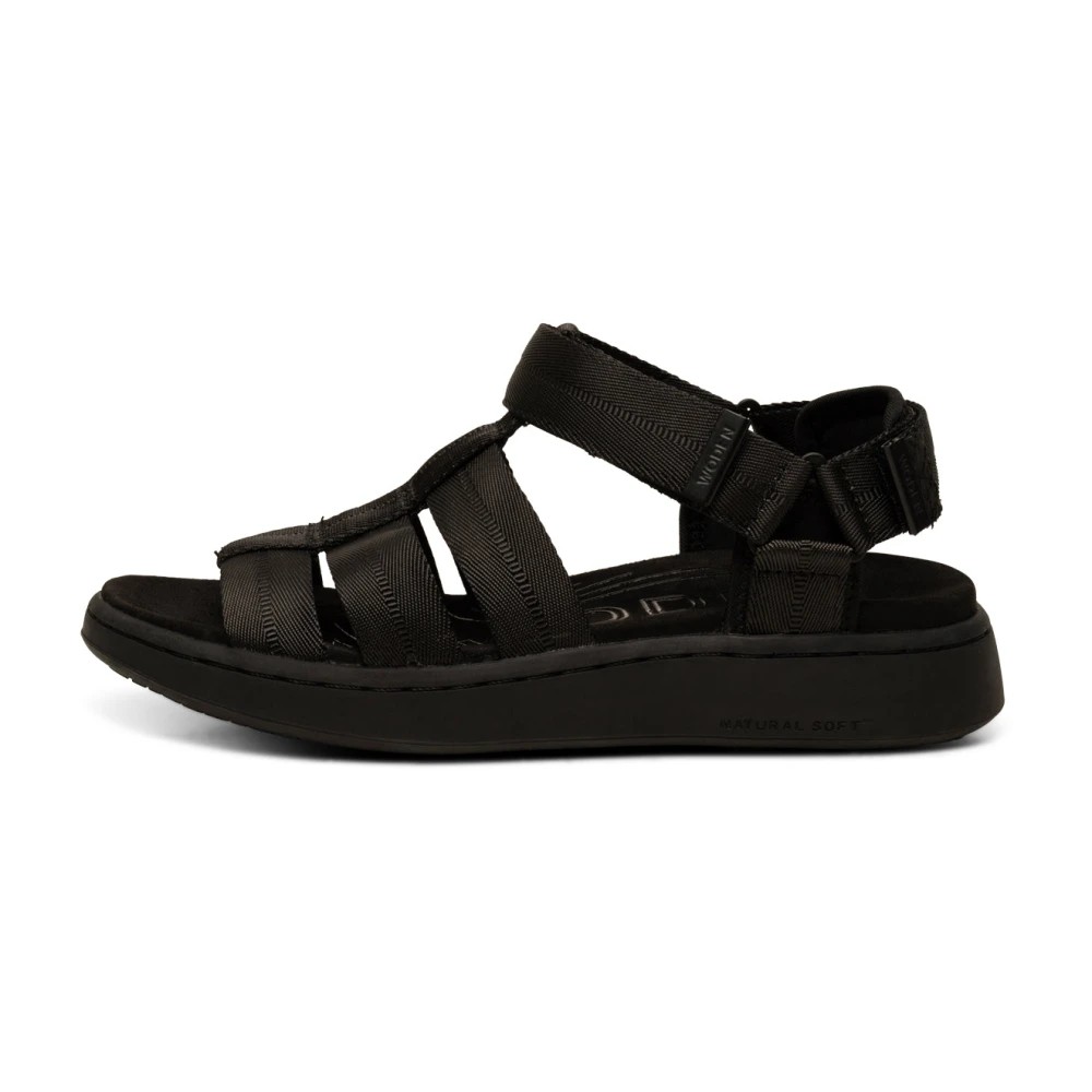 Black Woden Line Fisherman sandals for women featuring a strappy design, adjustable ankle strap, and cushioned sole for comfort.