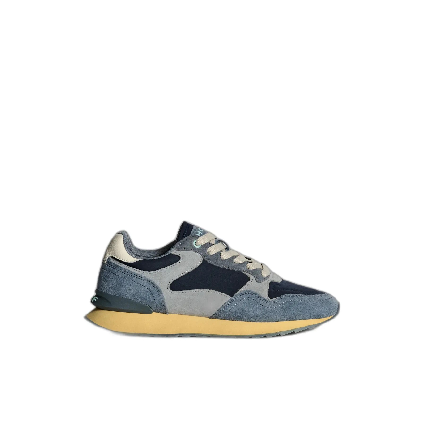 Women's Hoff City Moscow trainers featuring a mix of navy blue and grey suede, with a cream-colored tongue and a yellow rubber sole for a stylish, sporty look.
