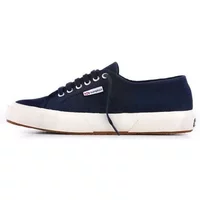 Navy blue Superga 2750 women's trainers with white rubber sole and metal eyelets.