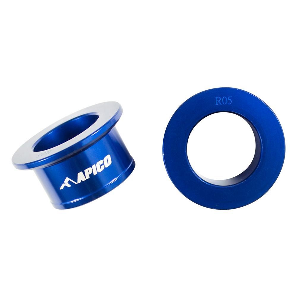 Blue aluminum rear wheel spacers by Apico, designed for Yamaha YZF 250/450 models from 2009 to 2025, featuring a smooth finish and engraved branding.