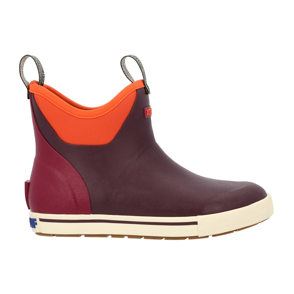 Xtratuf women's ankle deck camp boot in fig color with orange accents, made of rubber, featuring a slip-on design and a durable, non-slip sole.