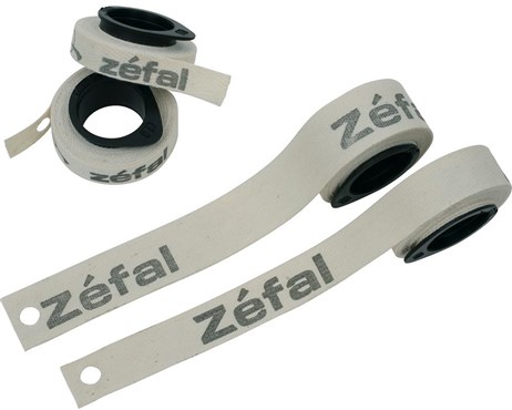 Cotton rim tape in beige with black "Zéfal" branding, rolled on a black spool, featuring two lengths of tape ready for installation.
