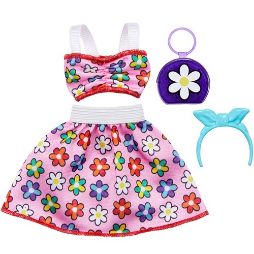 Pink floral dress with white straps, featuring colorful flowers, paired with a purple daisy purse and a blue bow headband.
