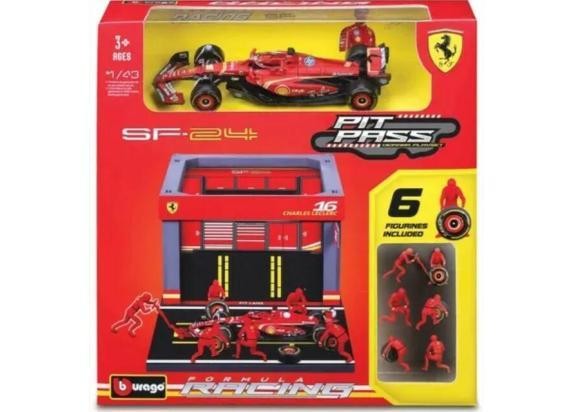 Red Ferrari F1 car model in 1:43 scale, featuring detailed pit stop scene with six figures and garage backdrop, all in a vibrant packaging showcasing the Ferrari logo.