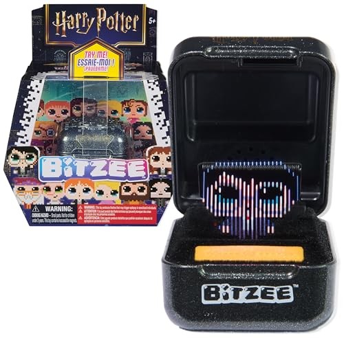 Interactive Bitzee Harry Potter pet in a black glittery case, featuring a digital display of a character's face, with colorful pixelated graphics and a yellow button for interaction.
