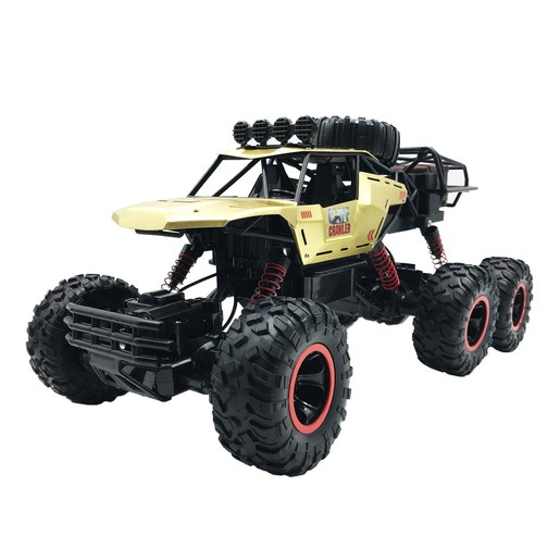 Gold and black 6-wheeled off-road remote control car with oversized tires, red accents, and a rugged design, featuring a detailed chassis and four front-mounted lights.