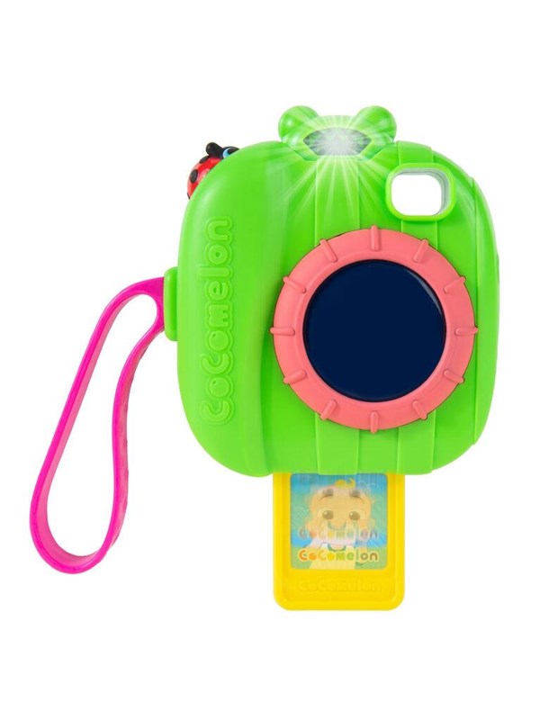 Bright green musical play camera with a pink strap, featuring a circular lens and a ladybug design on top, includes a yellow card with CoComelon branding.