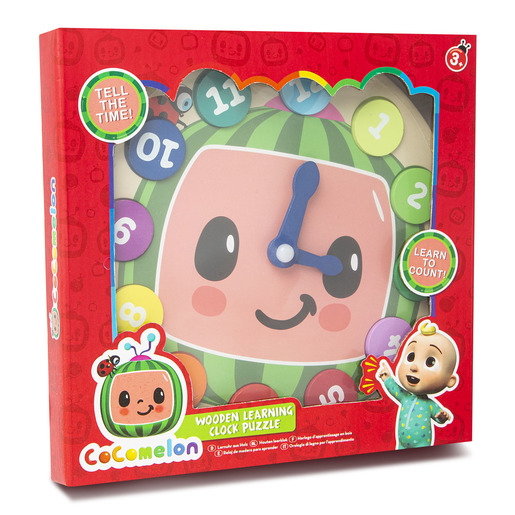 Colorful wooden learning clock puzzle featuring a smiling character face, large numbers, and blue hands, packaged in a bright red box with CoComelon branding.