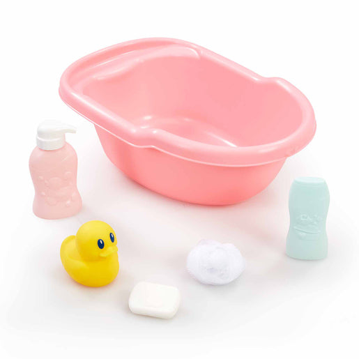Pink plastic bathtub with a yellow rubber duck, a pink soap bottle, a blue shampoo bottle, and a white bath puff arranged around it.