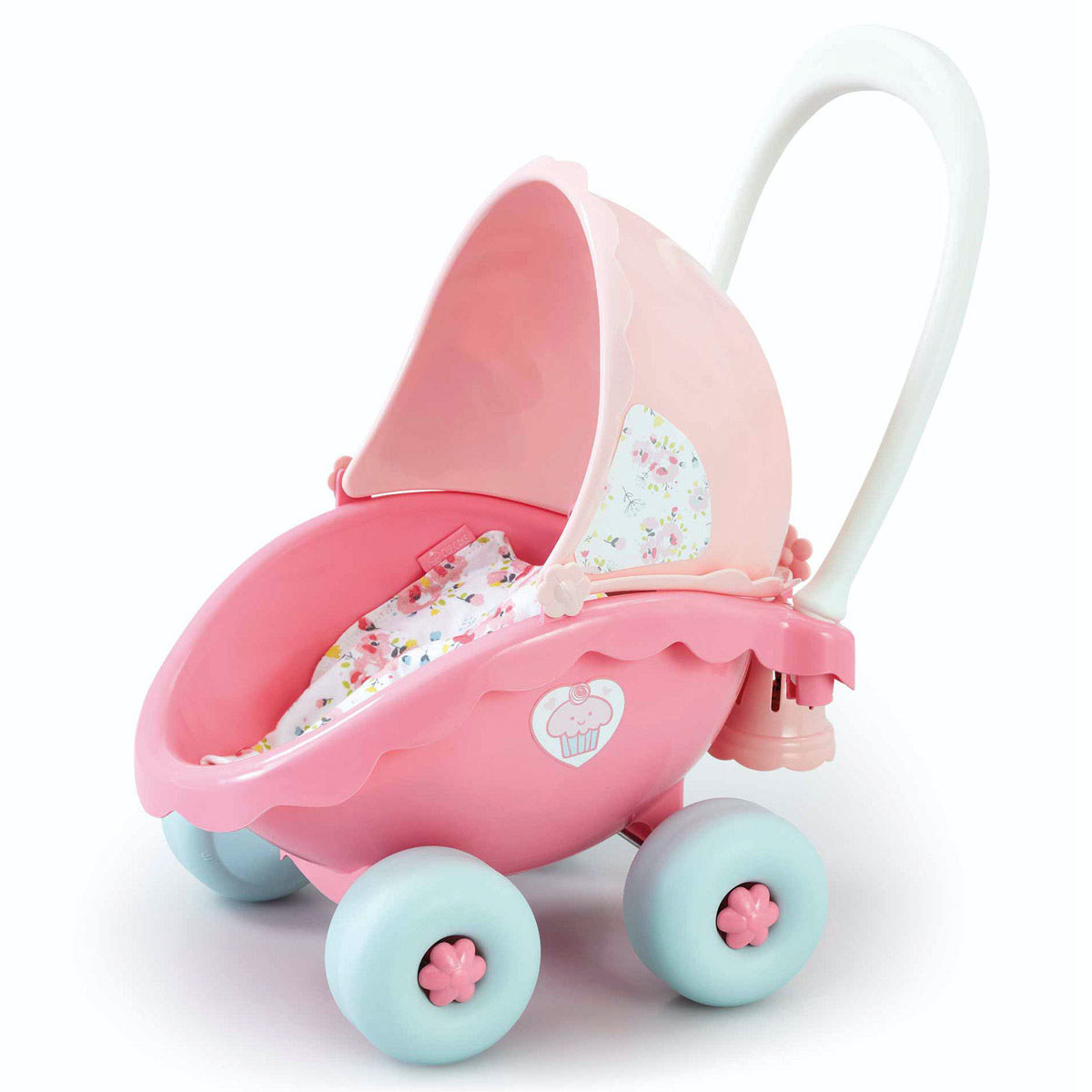 Pink and white toy pram with a scalloped edge, floral-patterned bedding, and light blue wheels, designed for imaginative play by young children.