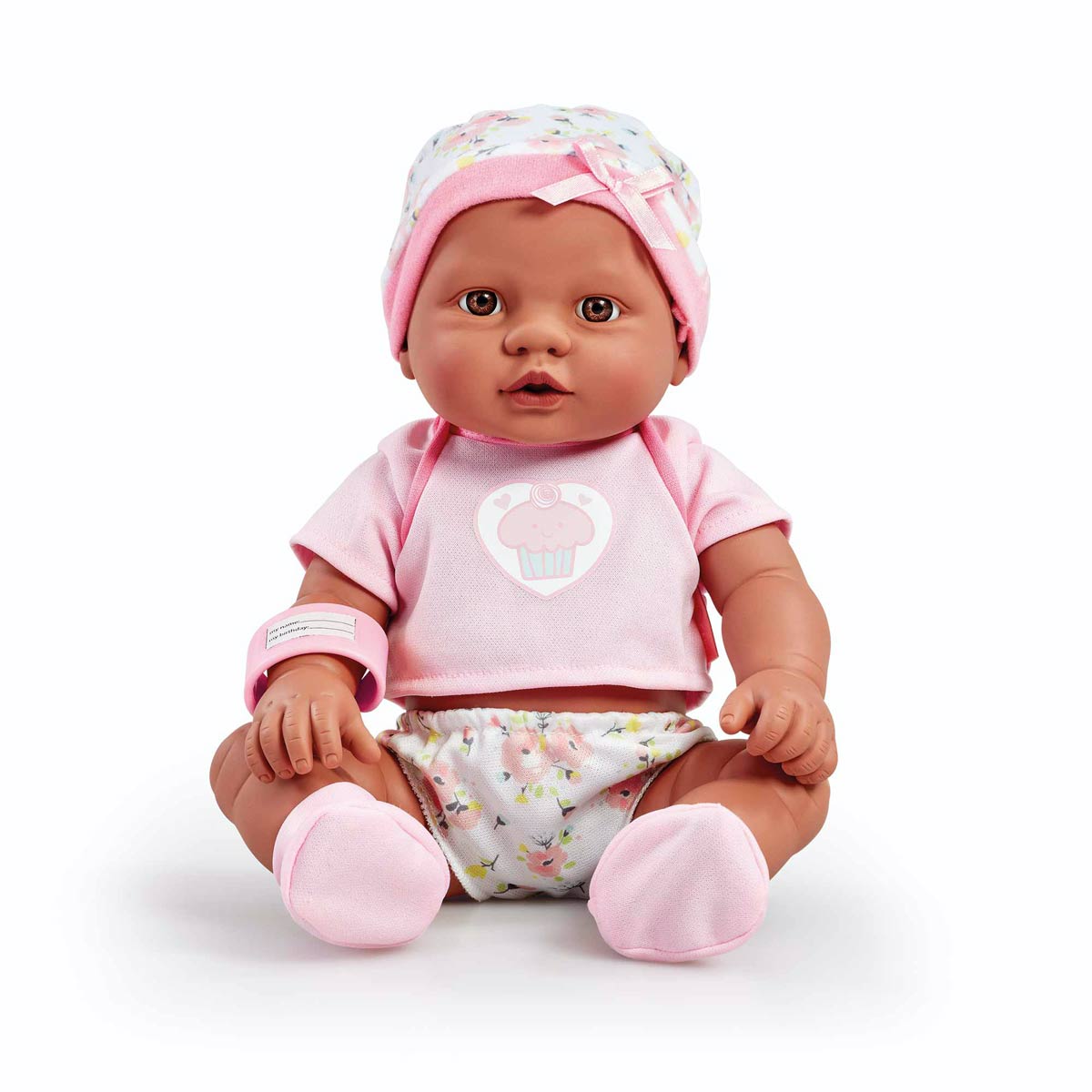 Cupcake Newborn Baby Tilly Doll features a soft, pink outfit with a cupcake graphic, a floral-patterned diaper, and a matching hat, with realistic facial details and movable limbs.