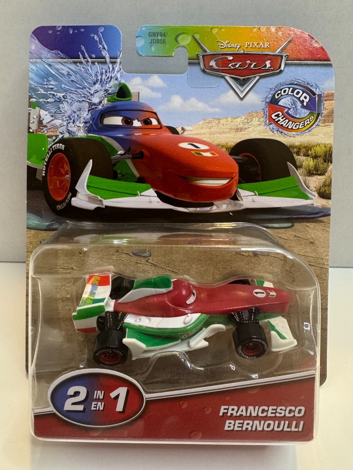 Francesco Bernoulli Colour Changers vehicle in red and green, featuring a sleek design, racing wheels, and a vibrant packaging with water splash graphics from Disney Cars.