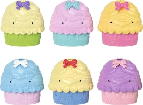Colorful cupcake-shaped dolls in pastel shades of pink, yellow, green, and purple, each topped with a bow and featuring a textured frosting design.