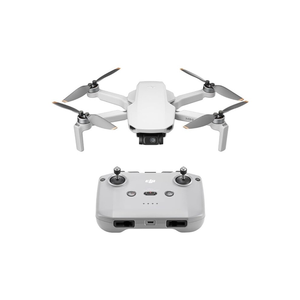 Grey DJI Mini 4K quadcopter with four rotors, a 12 MP camera, and a remote controller featuring buttons and ports, showcasing a sleek, compact design.