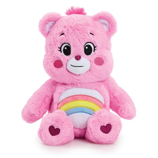 A soft, plush pink bear with a rainbow on its belly, large eyes, and rosy cheeks, featuring heart-shaped patches on its feet, perfect for early learning and imaginative play.