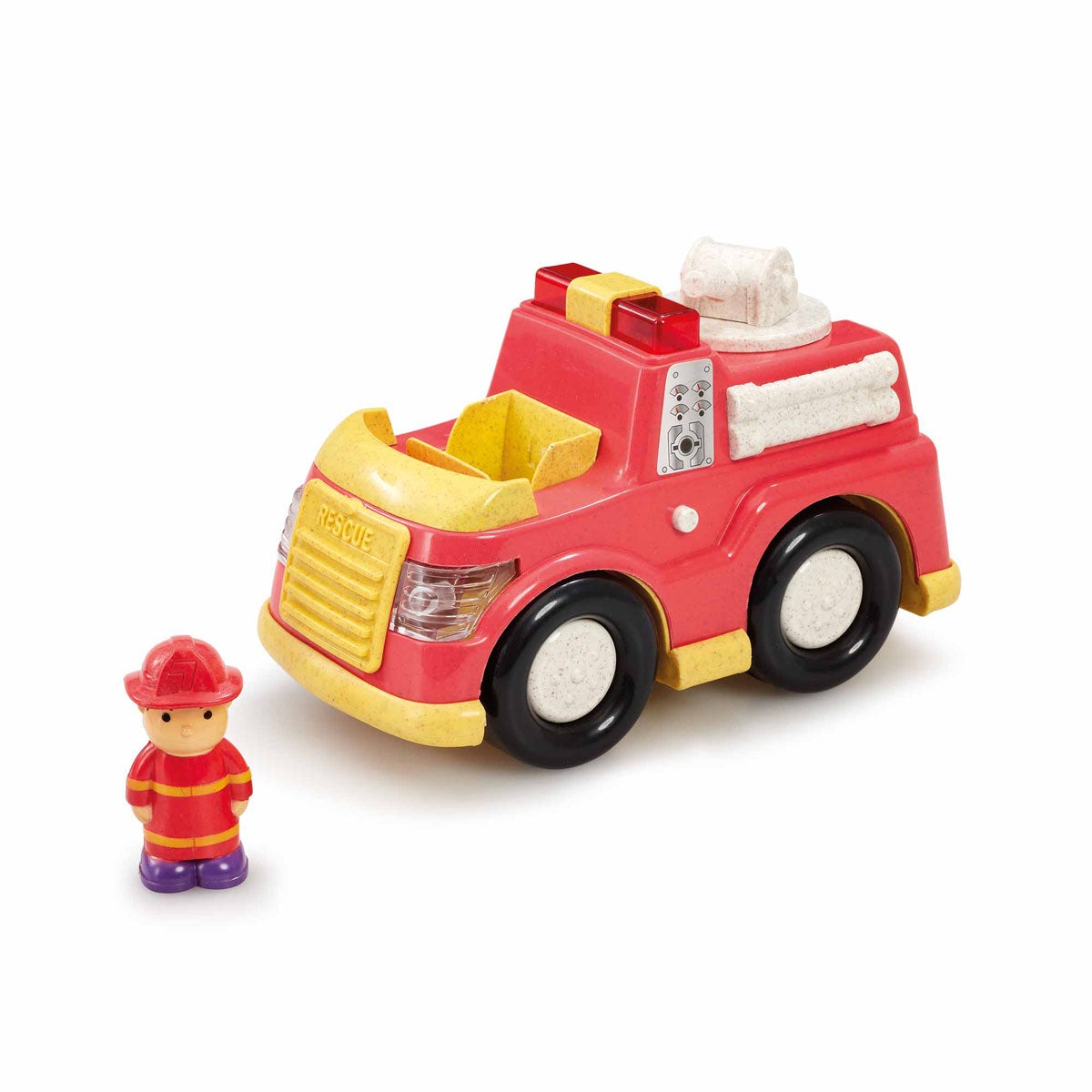 Bright red plastic fire engine with yellow accents, featuring lights and sounds, accompanied by a small firefighter figure in a red helmet and uniform.