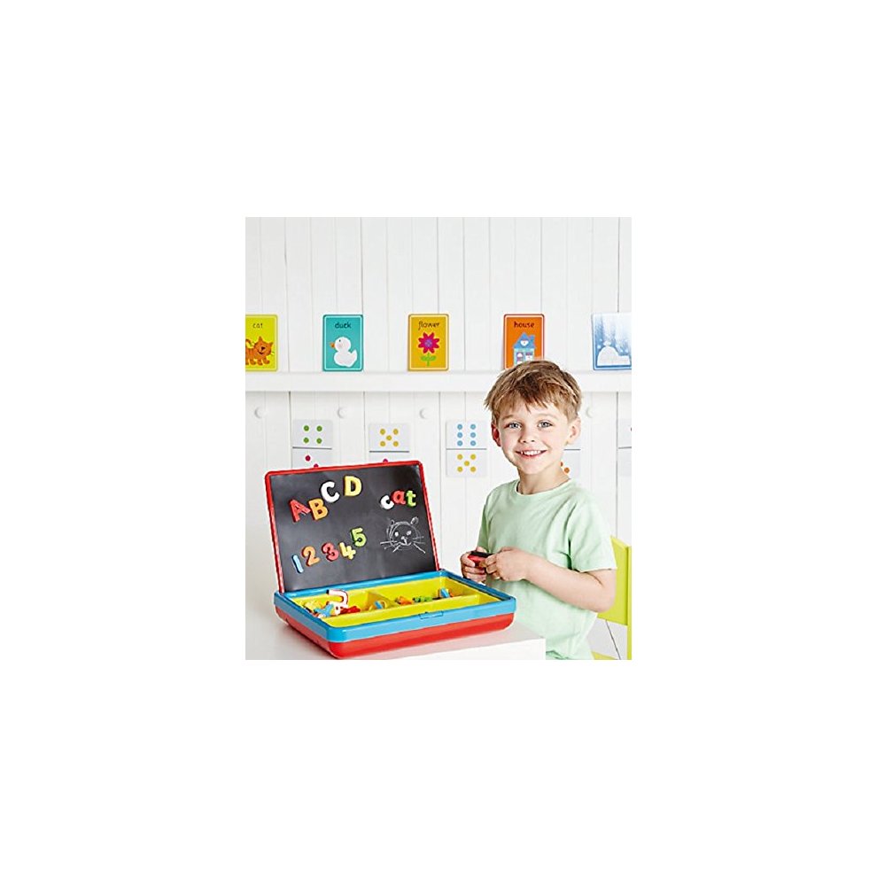 Bright red magnetic playcentre with a chalkboard, featuring letters and numbers, alongside colorful magnetic pieces, used by a young child in a playful learning environment.