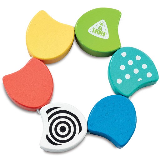 Colorful wooden twisty ring sensory toy featuring six curved pieces in yellow, green, red, blue, and white with polka dots and spiral designs, promoting tactile exploration for young children.