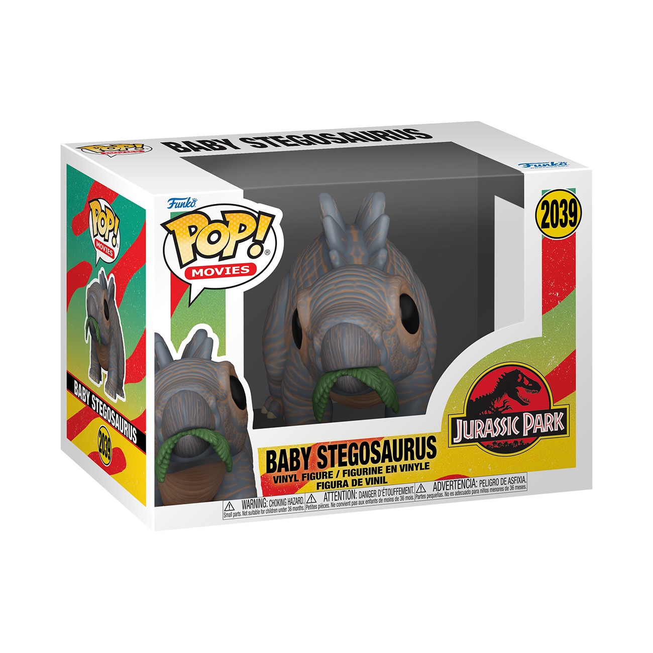 Cute vinyl figure of a baby Stegosaurus with a brown textured body, green spikes, and a friendly expression, displayed in a colorful Jurassic Park-themed box.