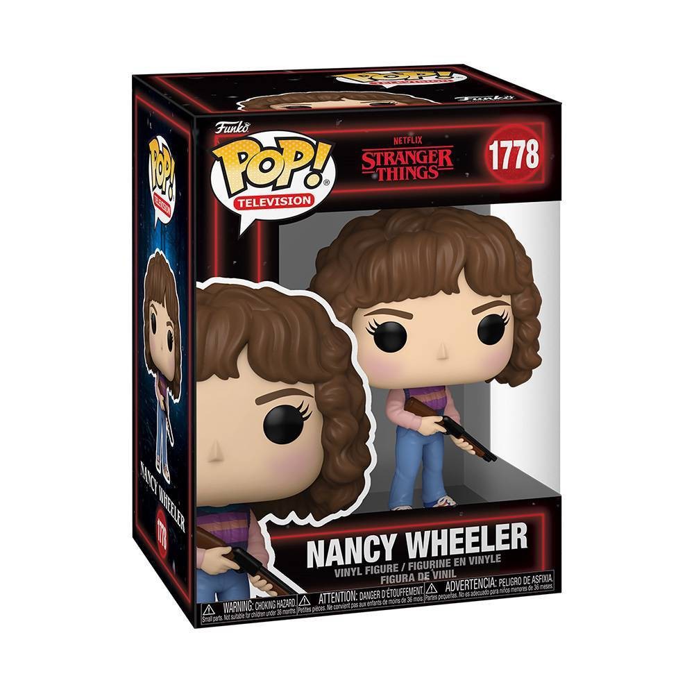 Vinyl figure of Nancy Wheeler from Stranger Things, featuring curly brown hair, holding a gun, dressed in a purple shirt and blue jeans, displayed in a colorful box.