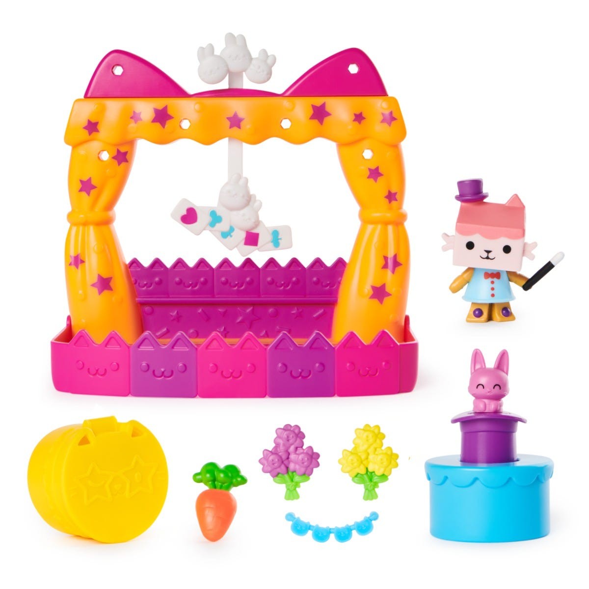 Colorful playset featuring a pink and yellow cat-themed balcony with a stage, a magician figure, and various accessories like flowers, a carrot, and a star-shaped container.