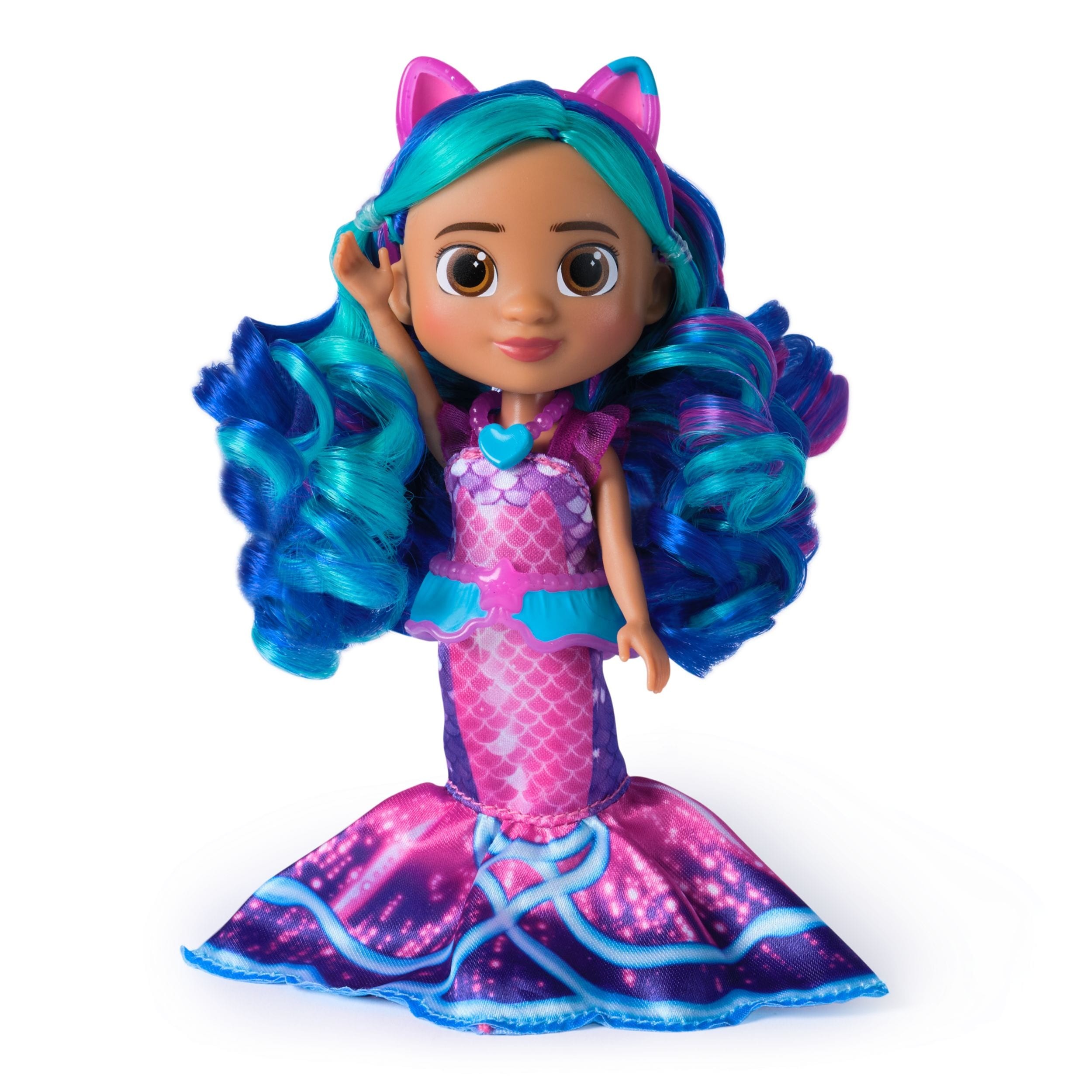 Gabby's Dollhouse Mer-tastic Gabby Doll features vibrant blue and teal hair, a shiny pink mermaid tail with a scale pattern, and playful cat ears on her head.
