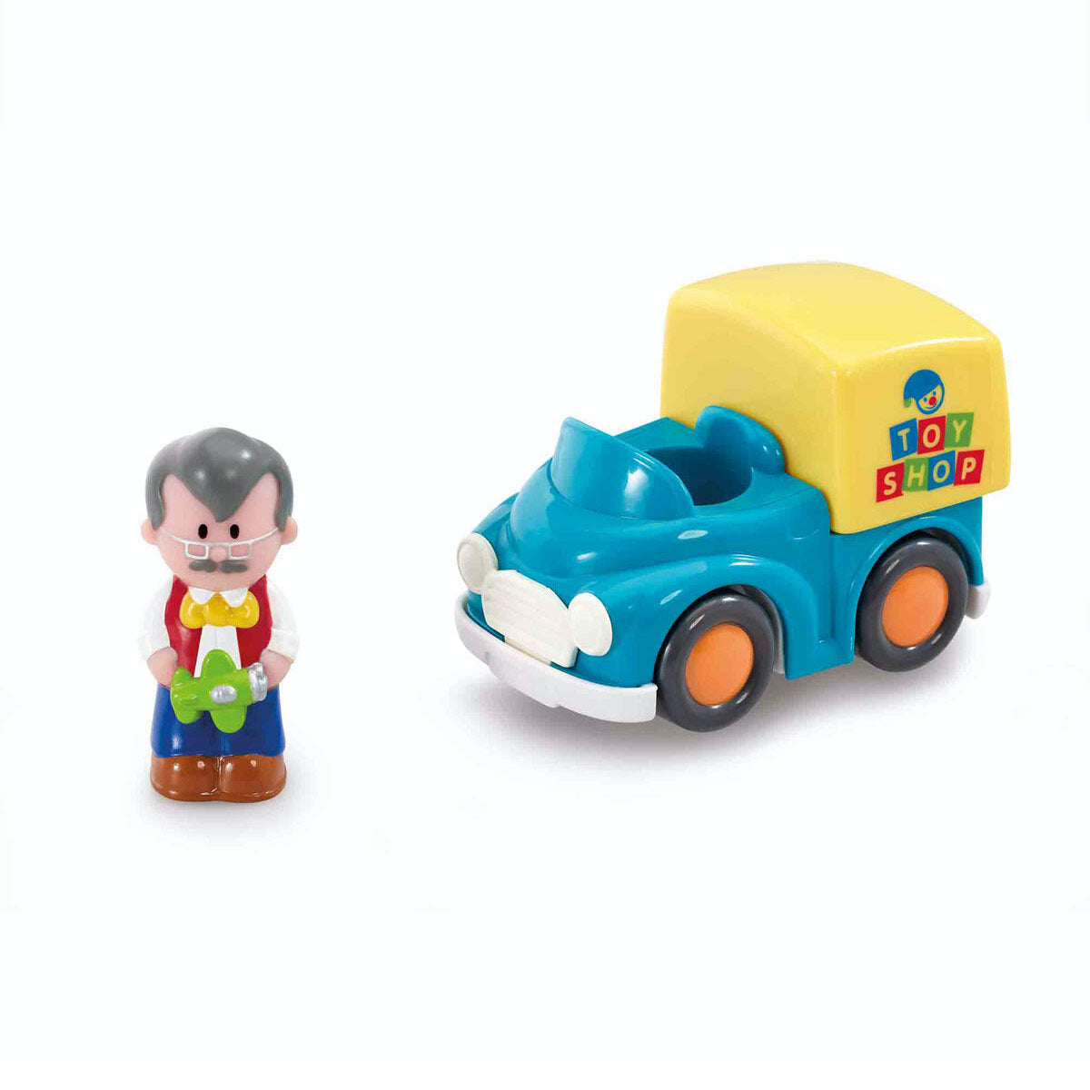 Bright blue toy van with a yellow cab and "TOY SHOP" logo, accompanied by a small, smiling figure in a red vest and bowtie holding a green toy.