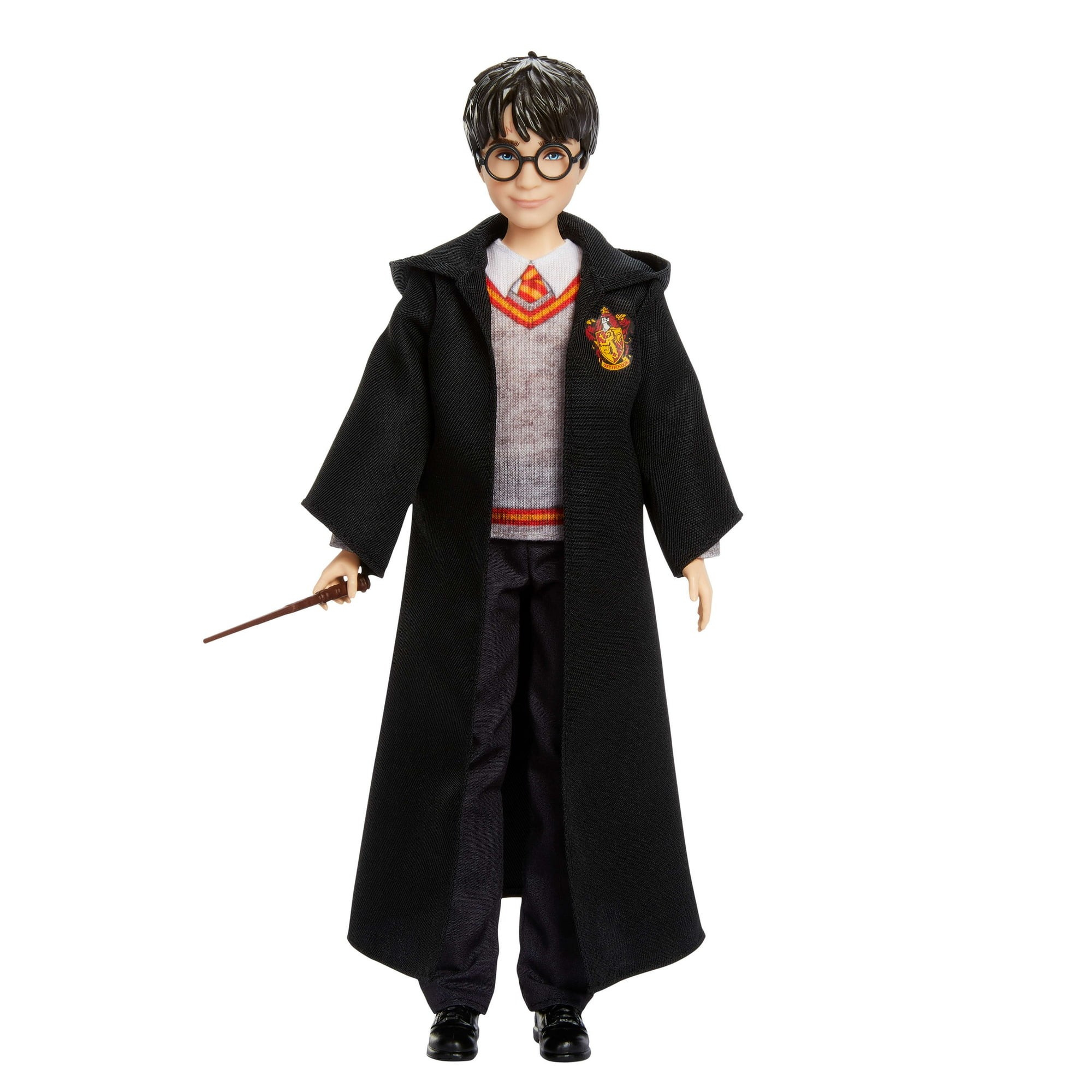 Harry Potter fashion doll wearing a black Hogwarts robe, grey sweater, and red-and-yellow tie, holding a wand, with round glasses and black hair.