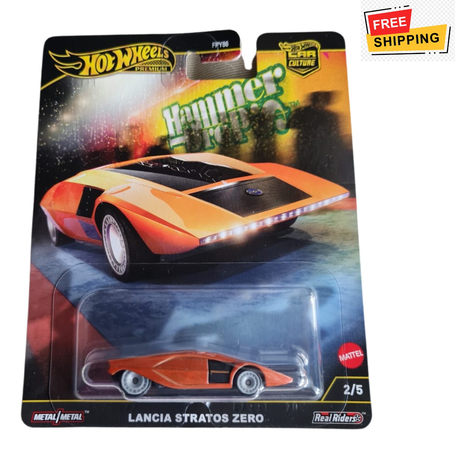 Hot Wheels Premium Car Hammer Drop features a sleek orange Lancia Stratos Zero model on a card, showcasing its futuristic design and metallic finish, with "FREE SHIPPING" label.