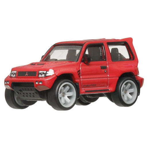 Red Mitsubishi Pajero Evolution toy vehicle with detailed bodywork, oversized wheels, and a sporty design, part of the Hot Wheels Car Culture Terra Trek series.
