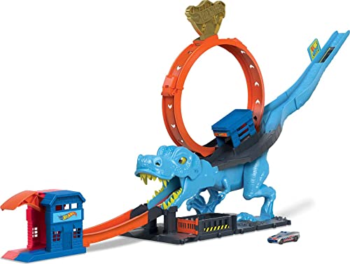 Bright blue T-Rex playset with an orange loop, featuring a ramp, a small building, and a toy car, designed for dynamic racing and dinosaur-themed play.
