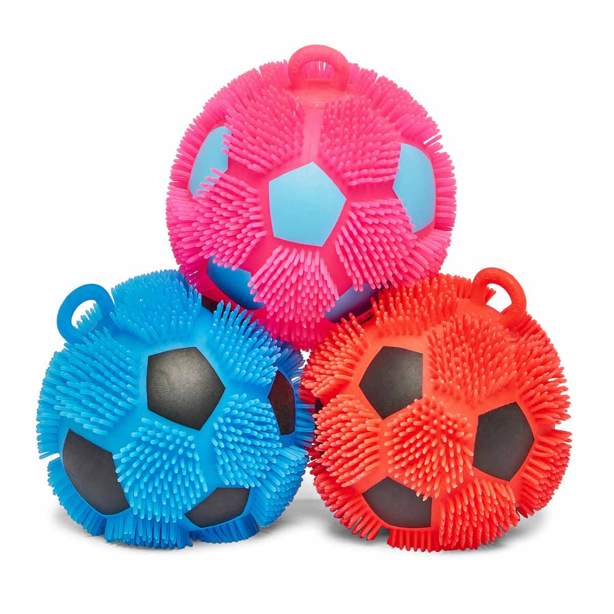 Three textured, jiggly puffer football fidget toys in pink, blue, and red, featuring spiky surfaces and a black inner ball, designed for sensory play.
