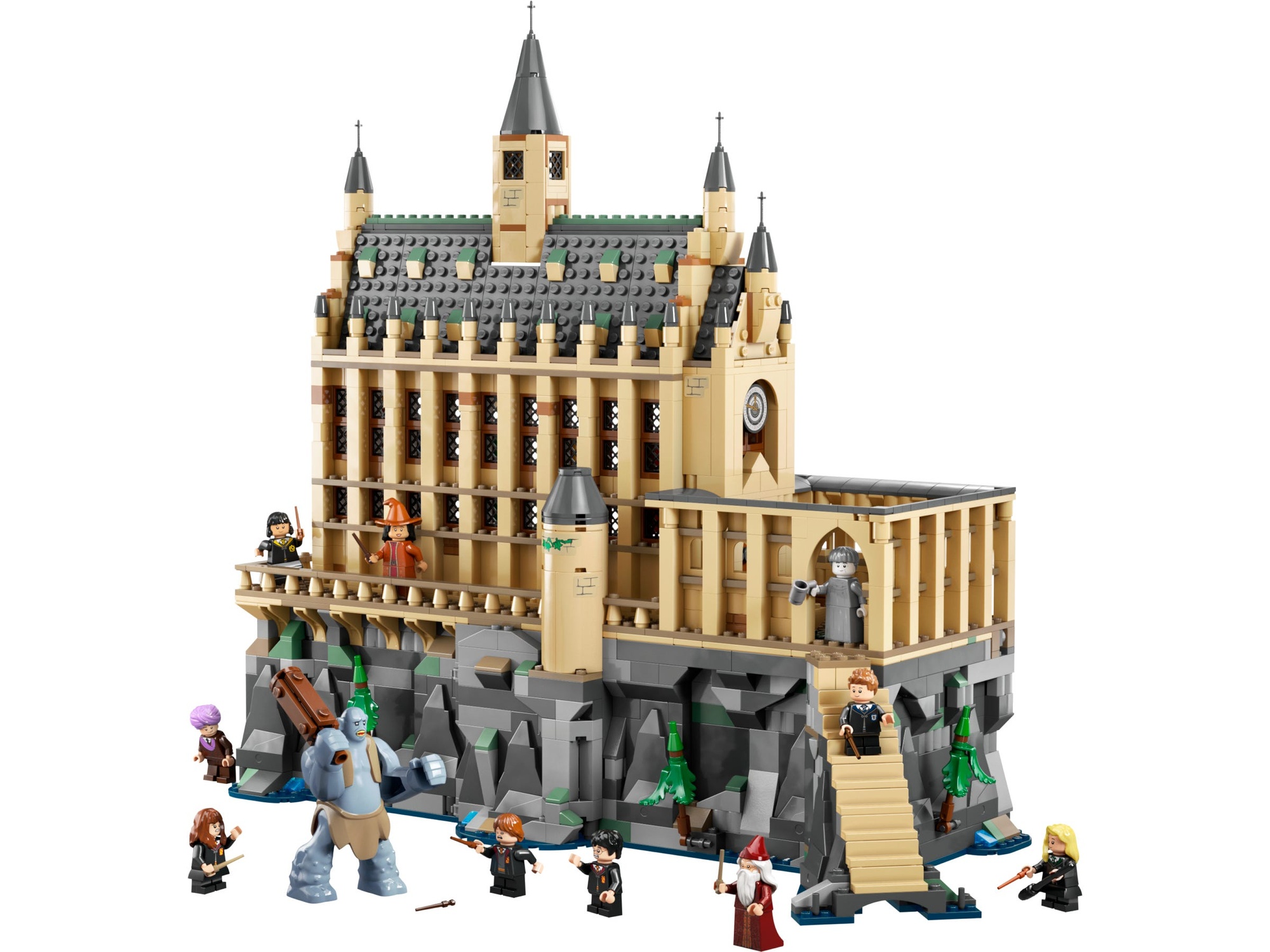 LEGO 76435 features a detailed Hogwarts Castle Great Hall with tan stone walls, a clock tower, and minifigures of characters in wizarding attire, set on a rocky base.