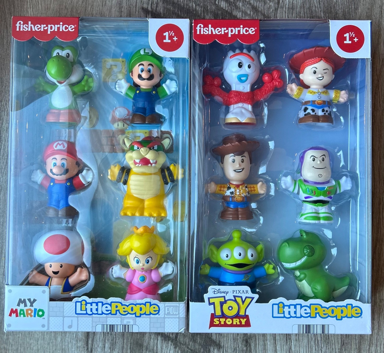Six colorful plastic figures from Fisher-Price's Little People My Mario and Toy Story sets, featuring characters like Mario, Luigi, Yoshi, and Buzz Lightyear, in a clear packaging.