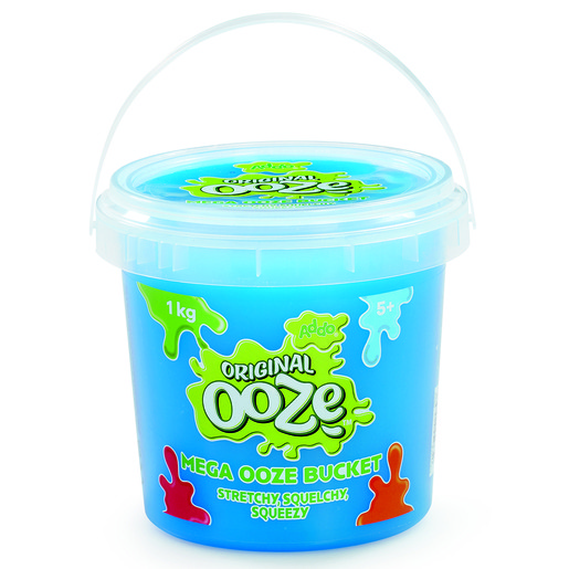 Bright blue plastic bucket labeled "Original Ooze" with a green splash design, containing 1 kg of stretchy, squishy ooze, featuring a clear lid and a sturdy handle.