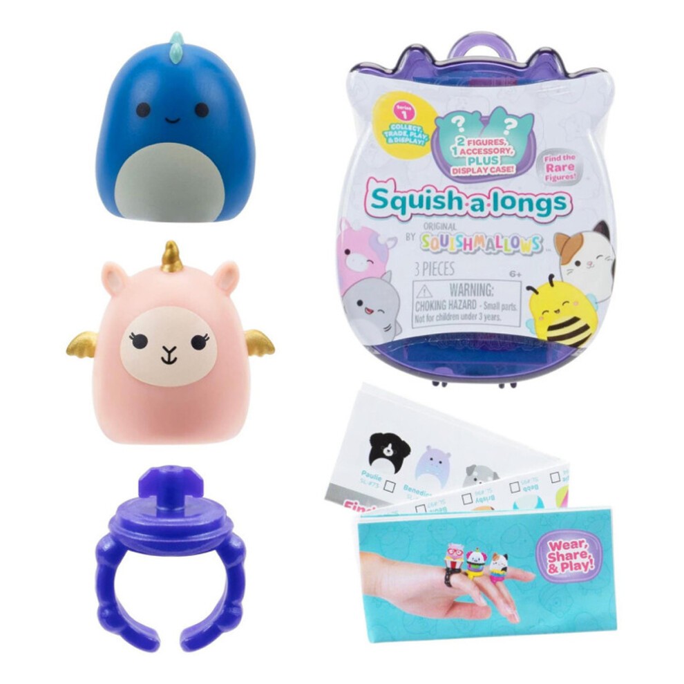 Blue whale and pink unicorn figures with a purple ring, packaged in a clear capsule labeled "Squish-a-Longs," featuring colorful character illustrations and a warning label.