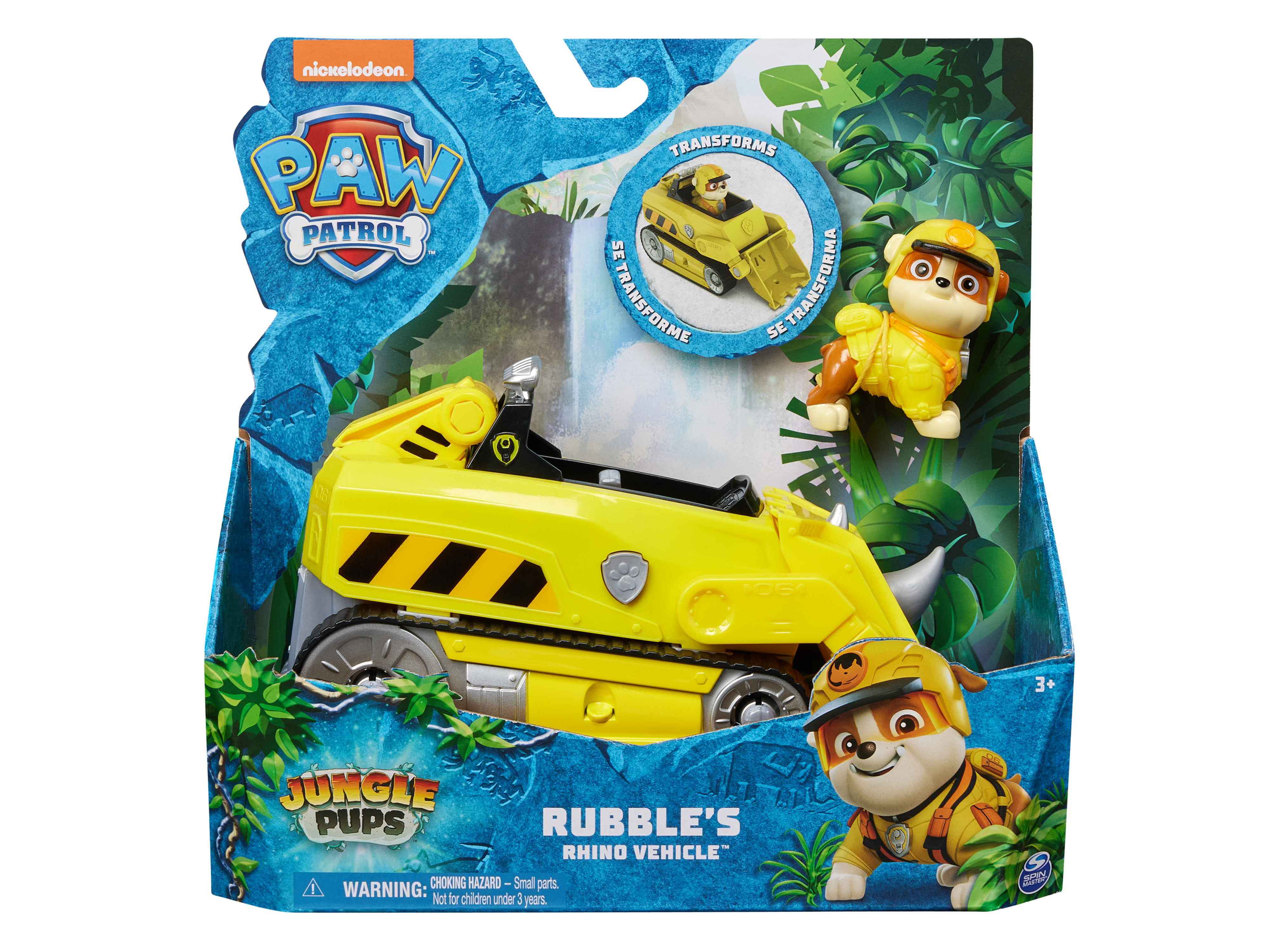 Bright yellow toy vehicle resembling a rhino, featuring a Paw Patrol logo, accompanied by a small figure of Rubble in a yellow jacket, set against a jungle-themed background.