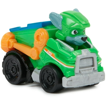 Green toy truck featuring a cartoon dog character with gray fur, equipped with a blue dump bed and orange wheels, part of the Paw Patrol Pup Squad Racers collection.