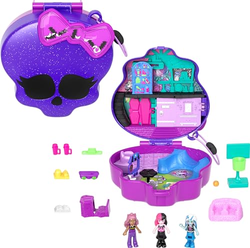Purple glittery skull-shaped playset opens to reveal colorful rooms, accessories, and three Monster High dolls, featuring a stylish design and playful elements.