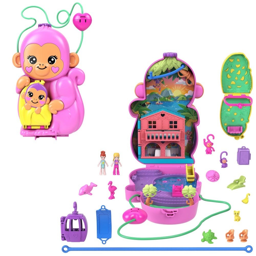 Bright pink Polly Pocket Mumma Monkey playset with a smiling monkey holding a baby, featuring a colorful interior scene, small figures, and accessories like a pool and jungle elements.